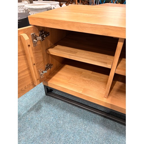 3088 - An oak two door television unit