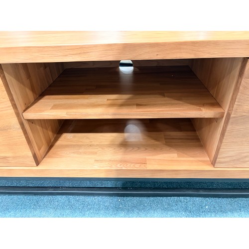 3088 - An oak two door television unit