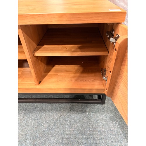 3088 - An oak two door television unit