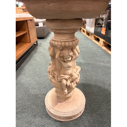 3093 - A stone effect cherub bird bath