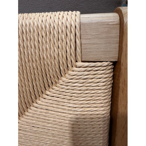 3102 - A Julian Brown Icaria chair with solid oak frame and woven seat pad and backrest