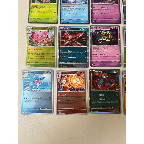 5018 - Assorted Pokémon cards including approximately 55 holo/reverse Holo cards and approximately 200 Poké... 