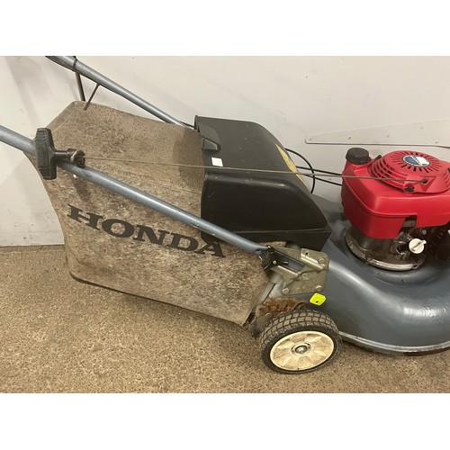 5021 - A Honda Izy model HRG6C35DEA 5.5HP high performance easy start petrol driven lawnmower  *Authority r... 