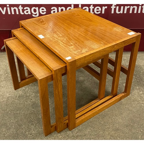 59 - A teak nest of tables