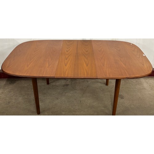 64 - A G-Plan teak oval extending dining table