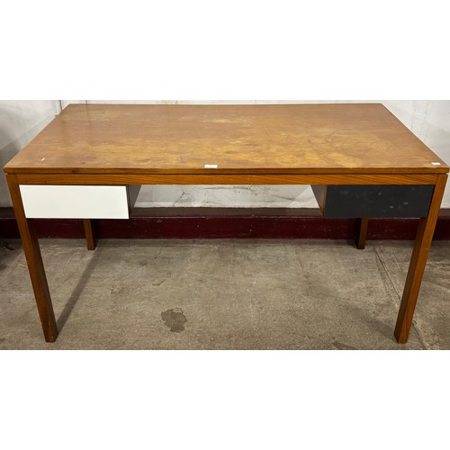 65 - A teak desk