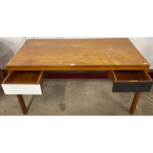 65 - A teak desk