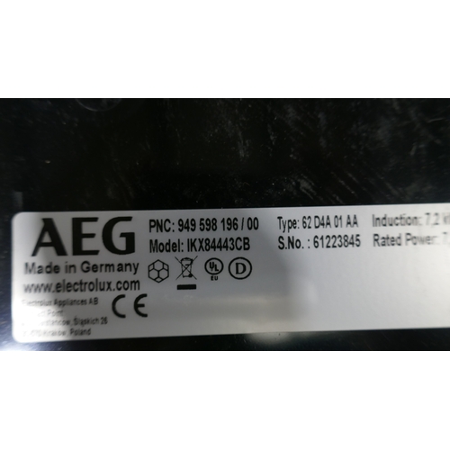 3153 - An AEG 4 zone induction hob (654-254) *This lot is subject to VAT
