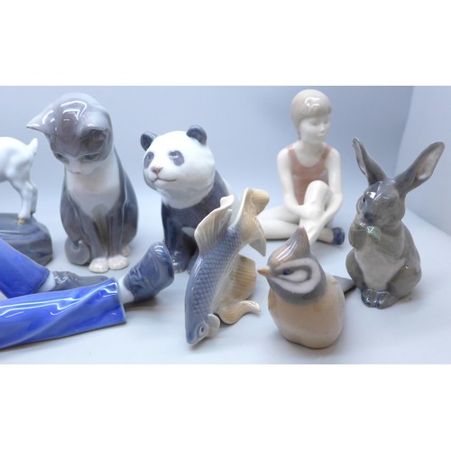 2008 - Eight Royal Copenhagen figures including cat, panda, fish, rabbit, lounging boy and others