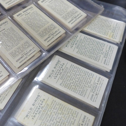 2038 - Collection of cigarette card sets to include; three sets of Godfrey Phillips 'Feathered Friends' all... 