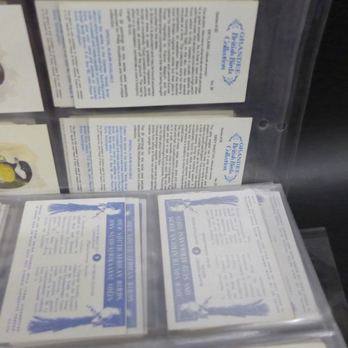 2038 - Collection of cigarette card sets to include; three sets of Godfrey Phillips 'Feathered Friends' all... 