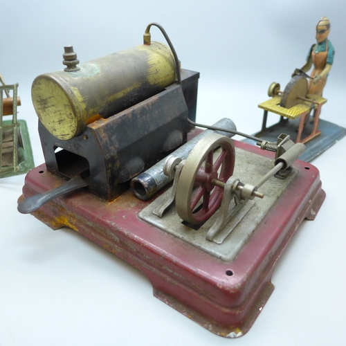 2011 - A vintage steam engine tin toy model believed to be Fleischmann, together with two German tin plate ... 