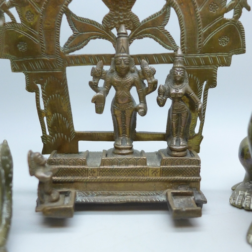2028 - A collection of brass objects including two trinket boxes, a deity and two animal figures