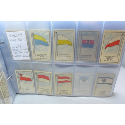 2039 - Two albums of German Massary cigarette cards part sets from various series, all flags