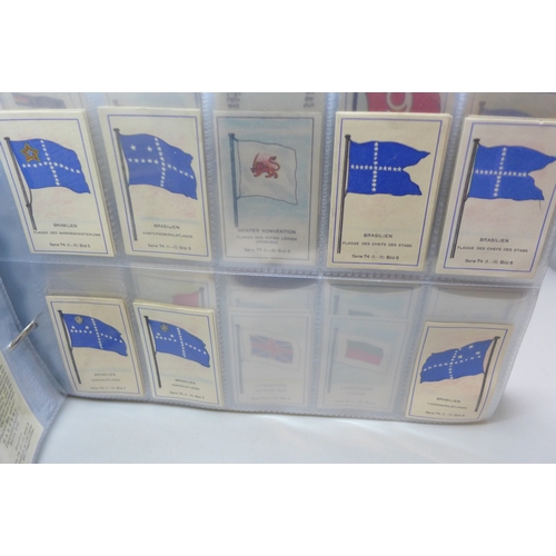 2039 - Two albums of German Massary cigarette cards part sets from various series, all flags