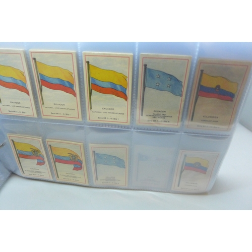 2039 - Two albums of German Massary cigarette cards part sets from various series, all flags