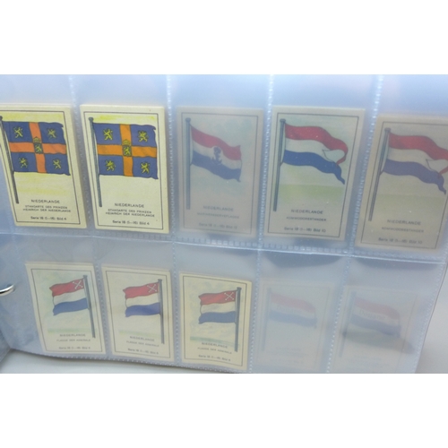2039 - Two albums of German Massary cigarette cards part sets from various series, all flags