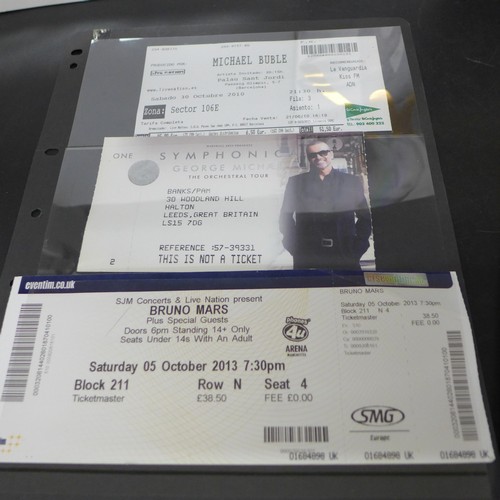 2051 - Music memorabilia; Autographed tour programmes of Michael Buble, plus George Michael, Robbie William... 