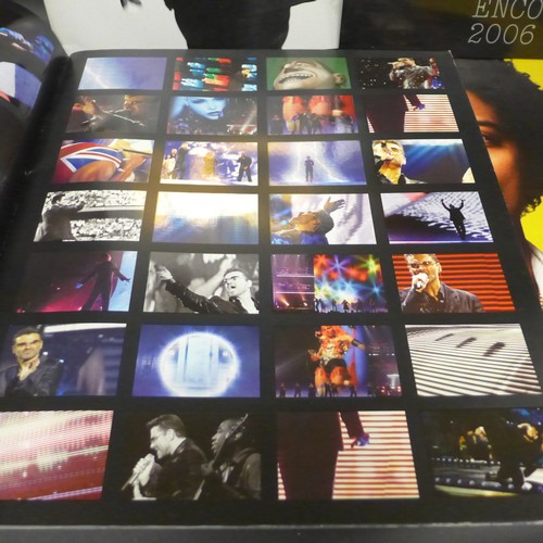 2051 - Music memorabilia; Autographed tour programmes of Michael Buble, plus George Michael, Robbie William... 