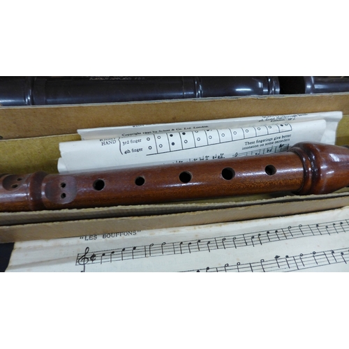 2033 - Three vintage recorders (two Schott's) and other bamboo woodwind instruments
