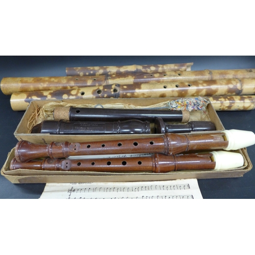 2033 - Three vintage recorders (two Schott's) and other bamboo woodwind instruments