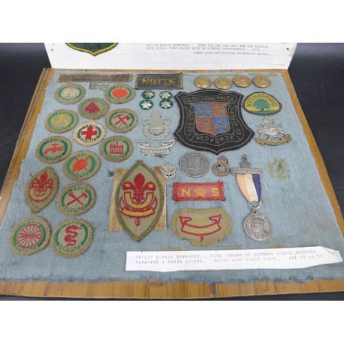 2057 - A collection of Scouts, Army Cadets, and other badges