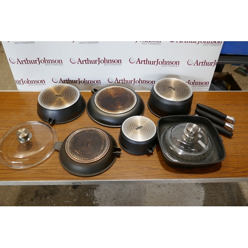 6017 - A quantity of Berghoff  Champion cookware,  (394-5) *This lot is subject to VAT