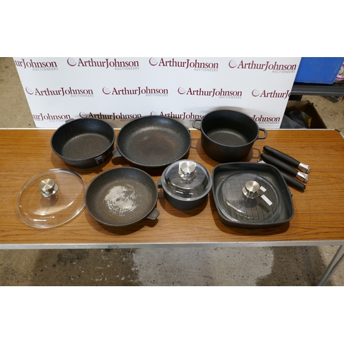 6017 - A quantity of Berghoff  Champion cookware,  (394-5) *This lot is subject to VAT