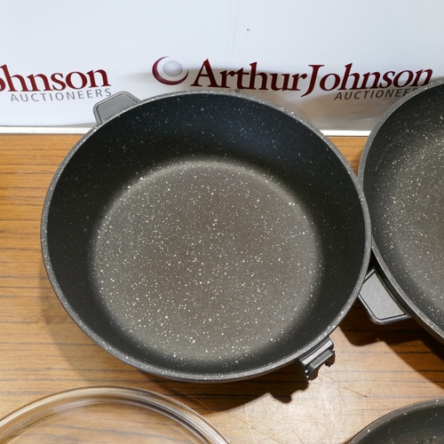 6017 - A quantity of Berghoff  Champion cookware,  (394-5) *This lot is subject to VAT