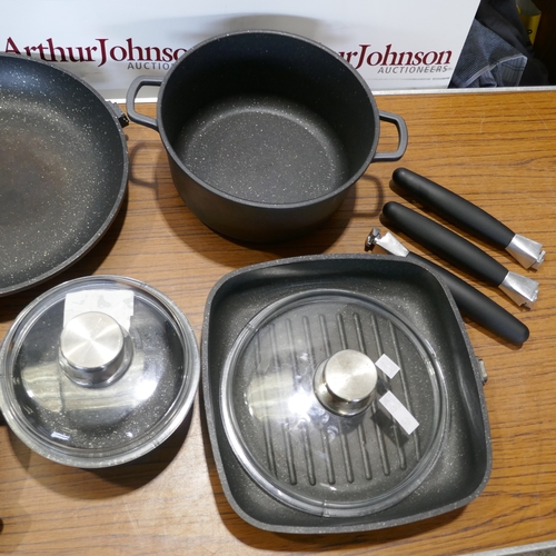 6017 - A quantity of Berghoff  Champion cookware,  (394-5) *This lot is subject to VAT