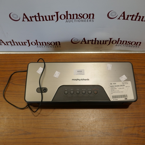 6059 - A Morphy Richards cordless vacuum sealer, (394-150) *This lot is subject to VAT