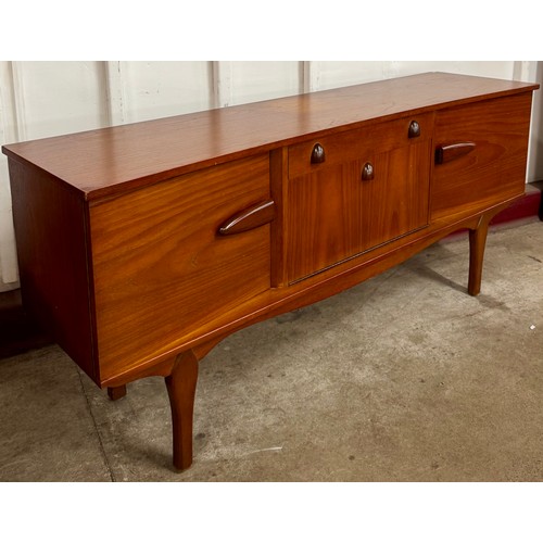 51 - A Jentique teak concave sideboard