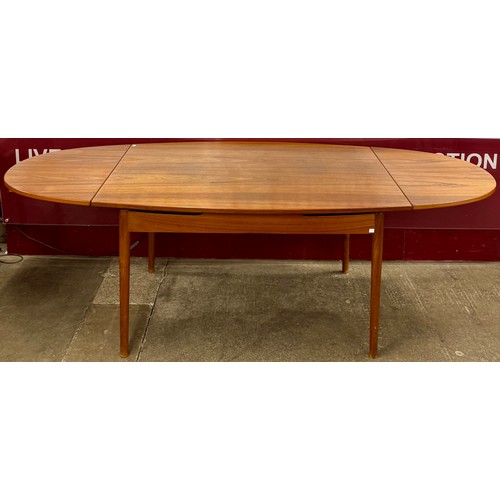 53 - A Danish teak extending dining table, attributed to Finn Juhl for Soren Willadsen