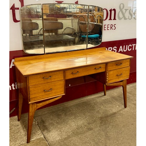 56 - An Alfred Cox walnut dressing table