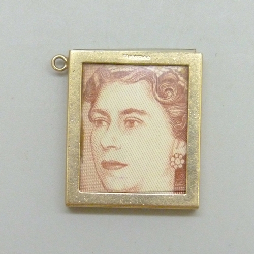 7013 - A 9ct gold framed 10 shilling note charm, hallmarked, 2.8g without the note or transparent cover,
