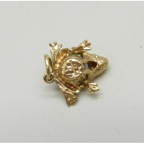 7017 - A 9ct gold charm in the form of a frog, hallmarked, 1.3g, 1.7cm including bail