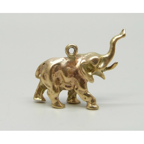 7019 - A 9ct gold charm in the form of an elephant, hallmarked, 5.3g, 2.4cm