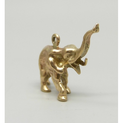 7019 - A 9ct gold charm in the form of an elephant, hallmarked, 5.3g, 2.4cm