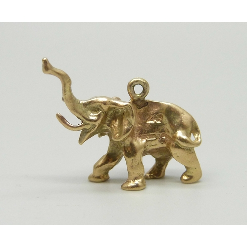 7019 - A 9ct gold charm in the form of an elephant, hallmarked, 5.3g, 2.4cm