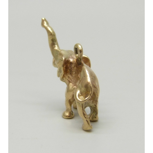 7019 - A 9ct gold charm in the form of an elephant, hallmarked, 5.3g, 2.4cm