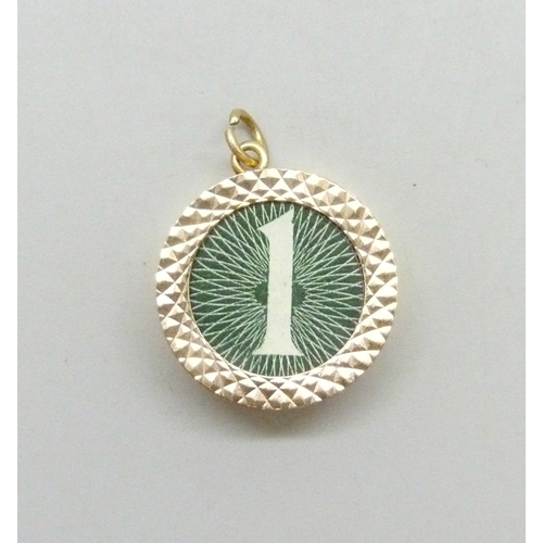 7020 - A 9ct gold £1 note charm, hallmarked, 3.4g, 2.4cm including loop
