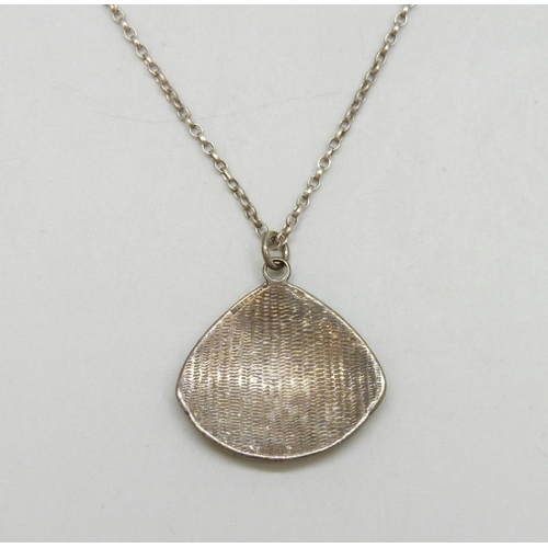 7028 - Pat Cheney, a Scottish silver and enamel Art Nouveau style necklace pendant on an unmarked chain, ha... 