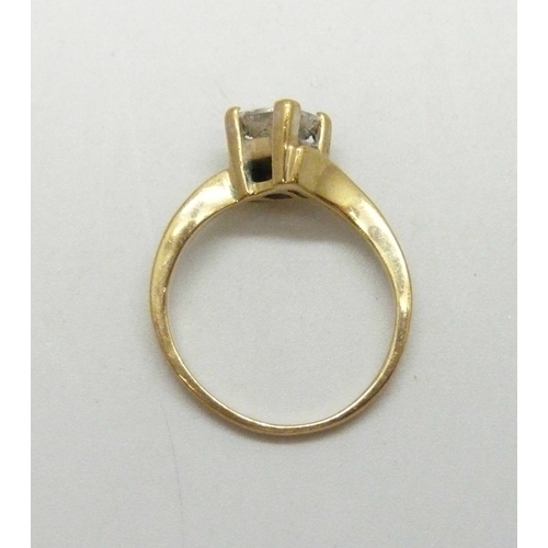 7029 - A 9ct gold white stone solitaire ring, 2.3g, J