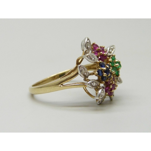 7037 - A 9ct gold, diamond, emerald, ruby and sapphire cluster ring,  3.8g, S