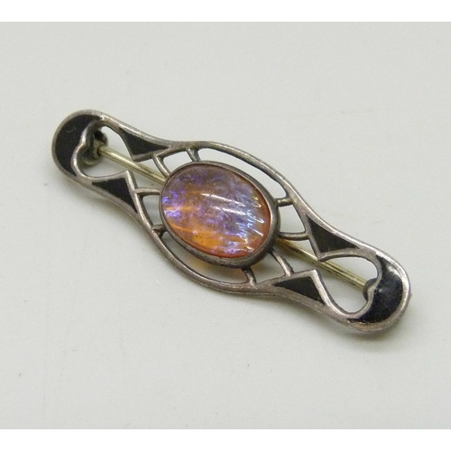 7041 - A Czech early 20th century secese Art Nouveau white metal brooch set with a Bohemian Dragon's Breath... 