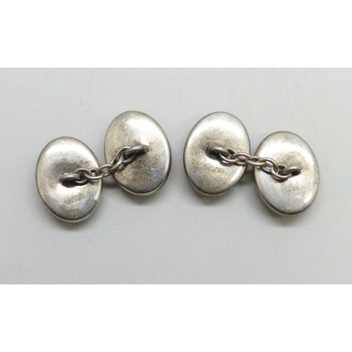 7057 - A pair of silver cufflinks depicting The Red Boy portrait by Thomas Lawrence, attributed to Thomas M... 