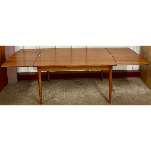 60 - A teak extending dining table