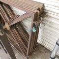 A quantity of iron fabricated bases and posts