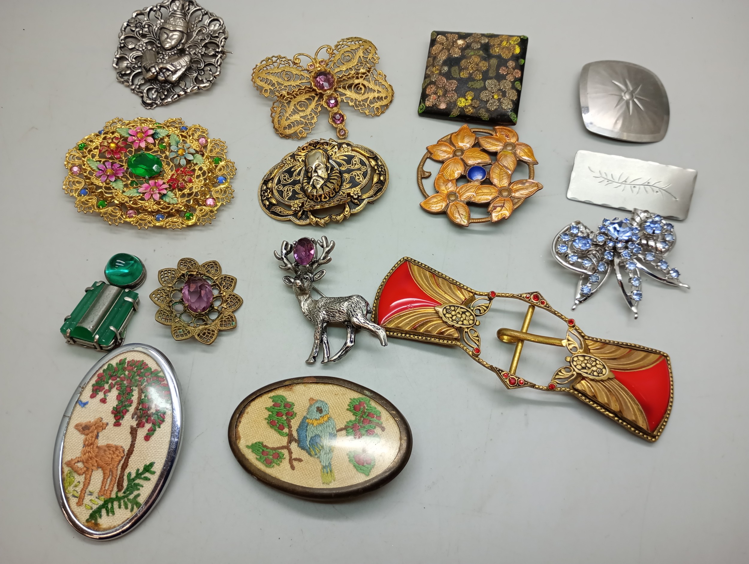 A collection of costume brooches including Czech, and an Art Deco clip