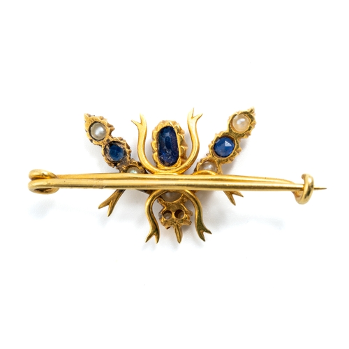 15 - A late 19th/early 20th century yellow gold sapphire and pearl insect brooch, modelled as a fly, set ... 